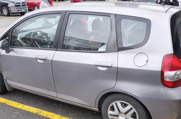 img of 40岁男子被发现在盗车内失去知觉，且在台风时被捕